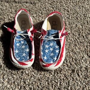 Hey Dude Women’s Slip-On Sneakers in Red, White & Blue Star Print